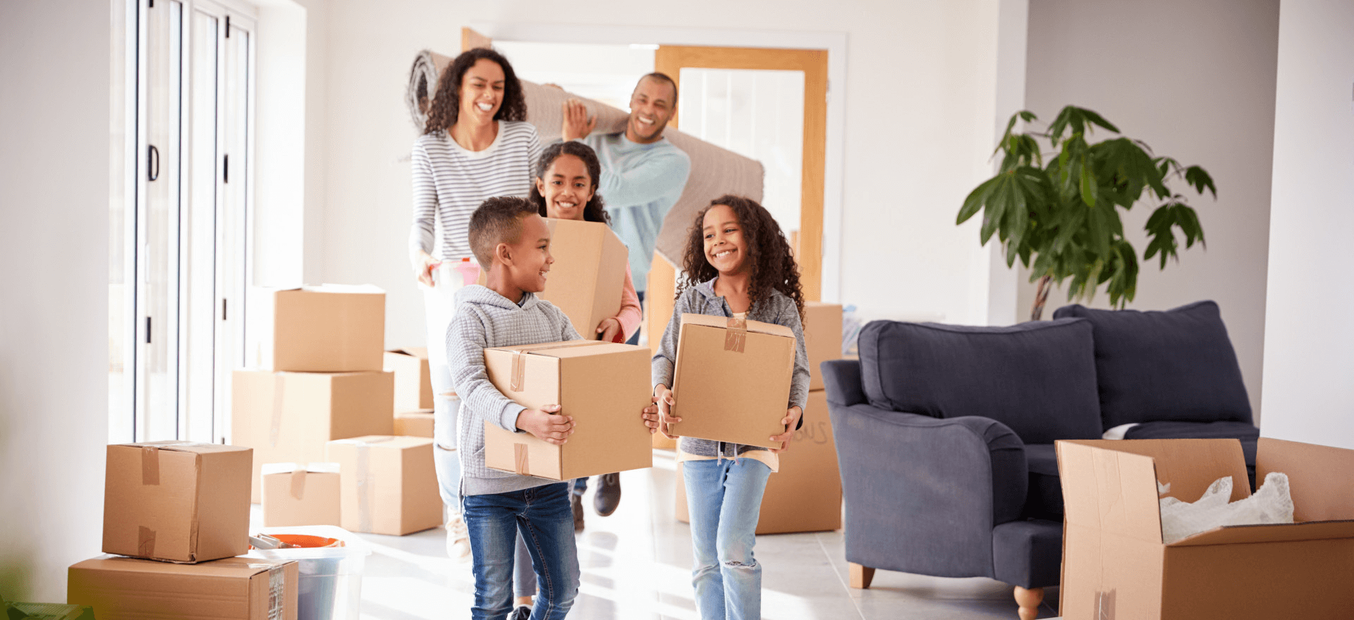Happy family moving in to their new home thanks to First United Funding